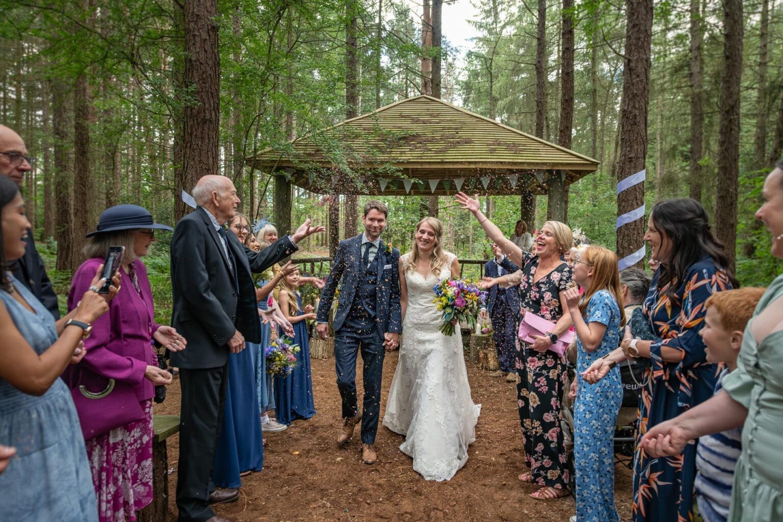Wedding ceremony confetti throw photo by Bevan Cockerill